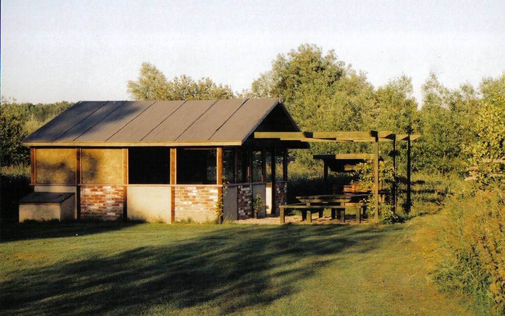 fishing hut on river bank