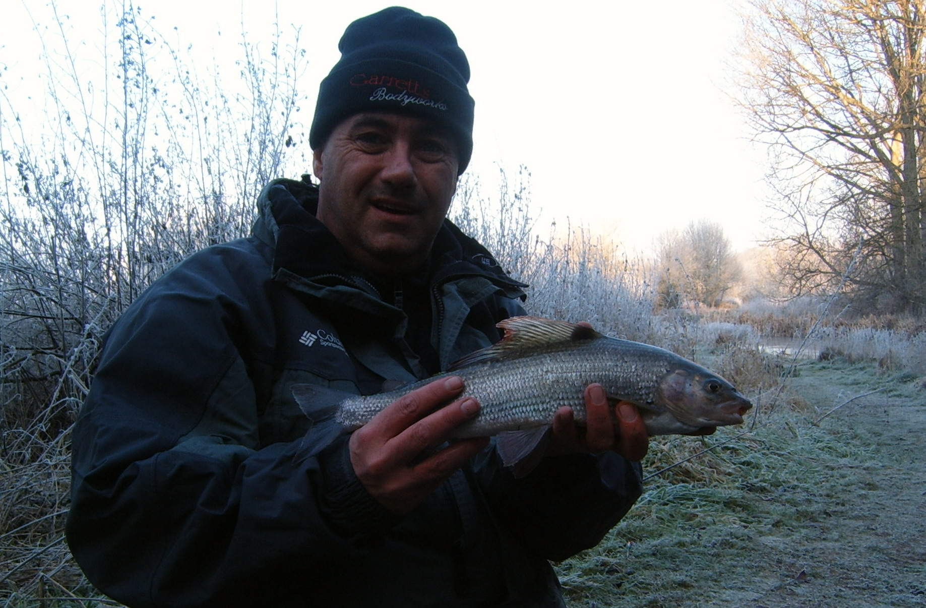 man holding fish