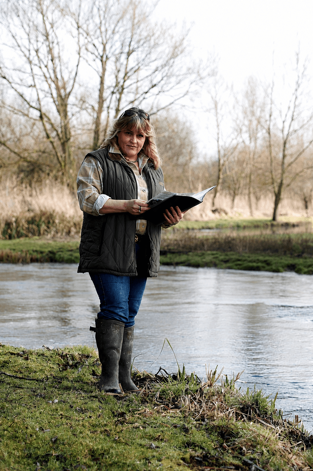 women by river