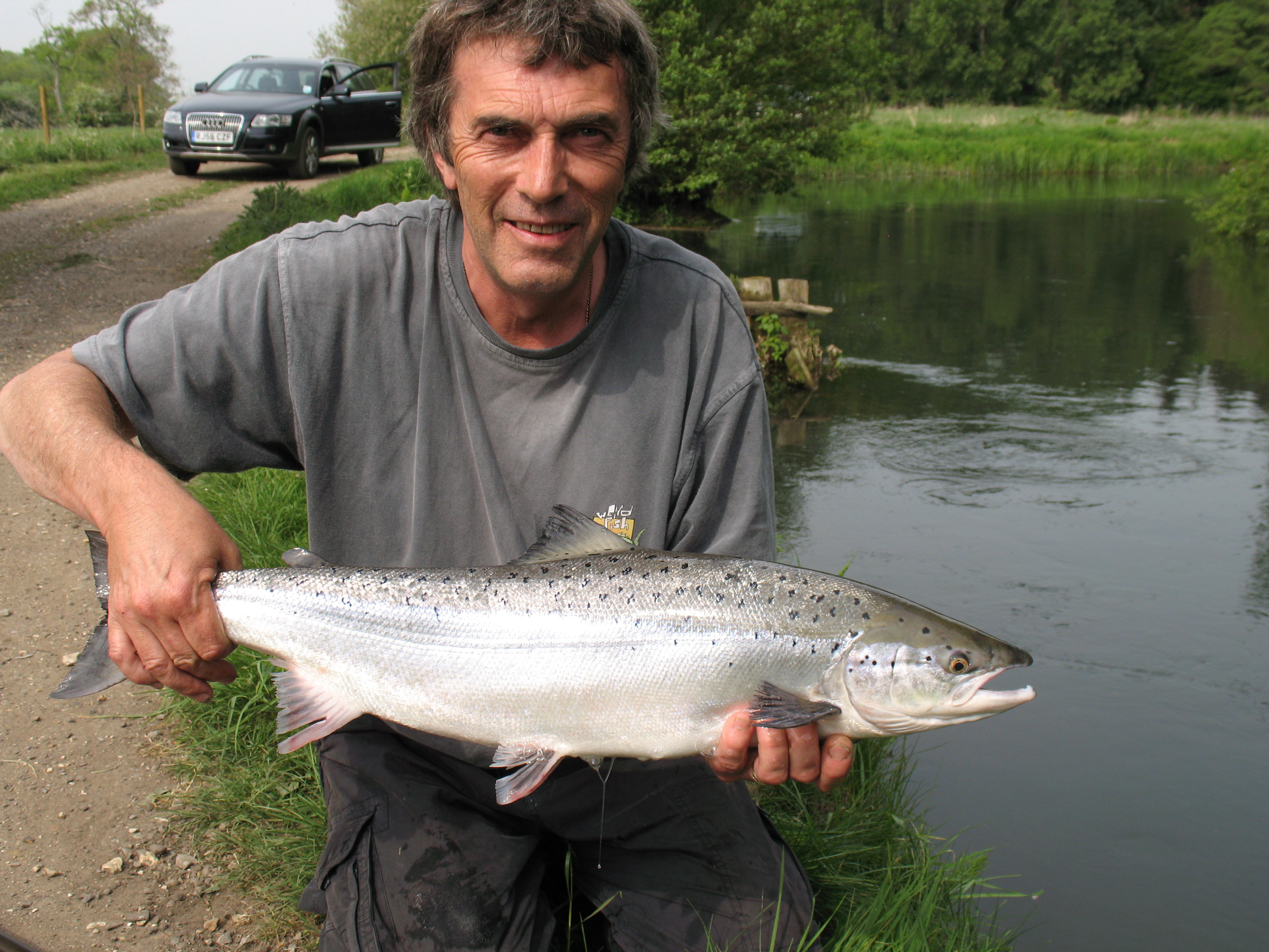 man holding salmon
